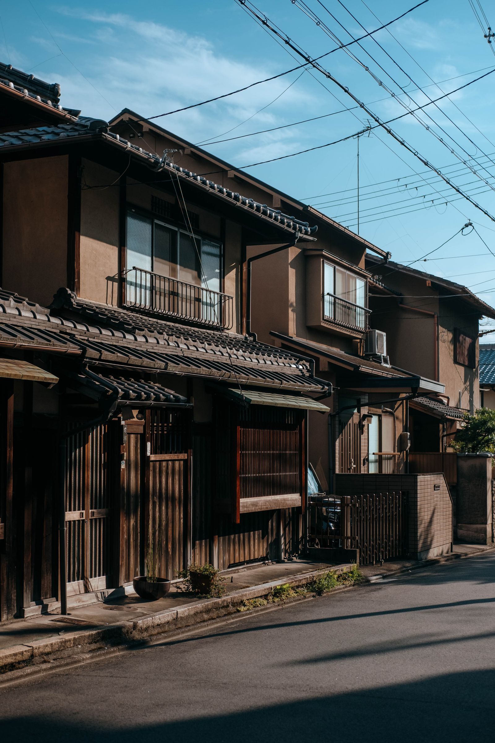Quiet residential street of Japanese houses on a sunny day